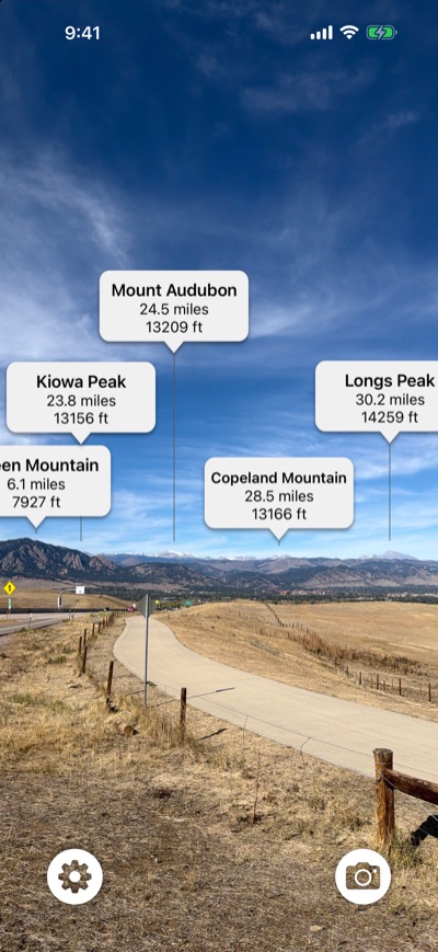 Labels for Mount Audubon, Kiowa Peak, Longs Peak, and Copeland Mountain over the plains near Boulder